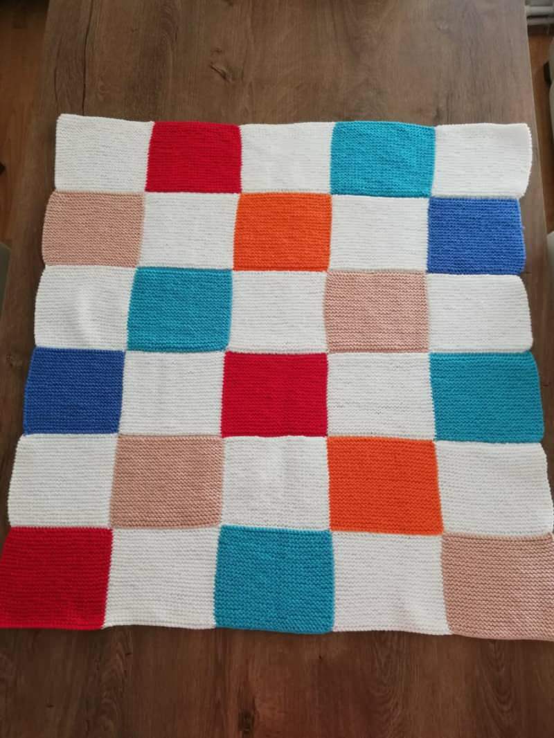 Comment tricoter une couverture pour bébé à l'envers