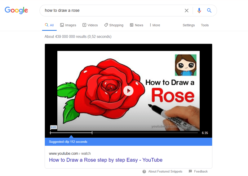 exemple de la meilleure vidéo youtube dans les résultats de recherche Google pour "comment dessiner une rose"