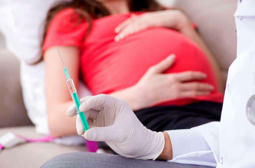 À quels mois de la grossesse faut-il administrer le vaccin contre la grippe ?