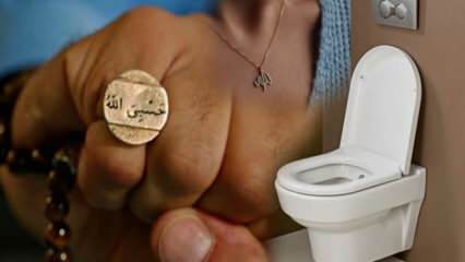 Est-il possible d'entrer dans les toilettes avec une amulette et un collier nommé Allah? Entrer dans les toilettes avec un verset et une inscription de prière.