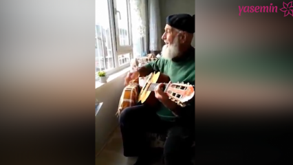 Grand-père jouant et disant "Ah lie world" avec la guitare!
