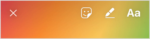 Appuyez sur l'icône happy-face en haut de l'écran pour ajouter des autocollants géolocalisés à votre histoire Instagram.